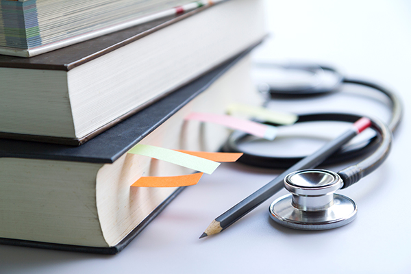 Textbooks and stethoscope