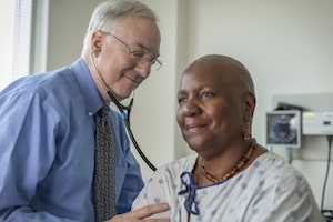 Dr. Ken Cowan and patient