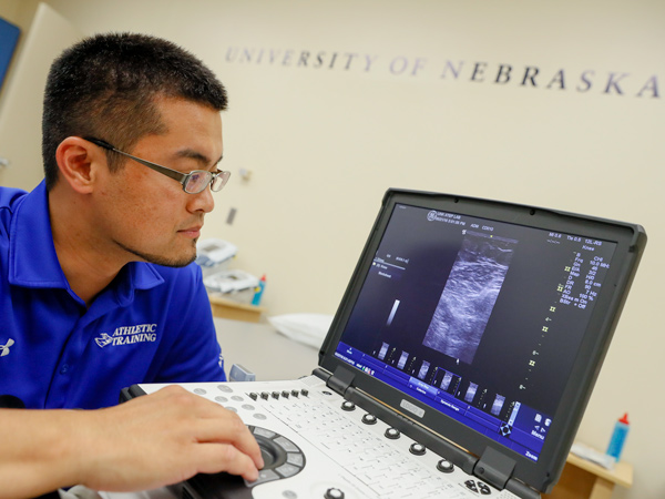Kazuma examining ultrasound