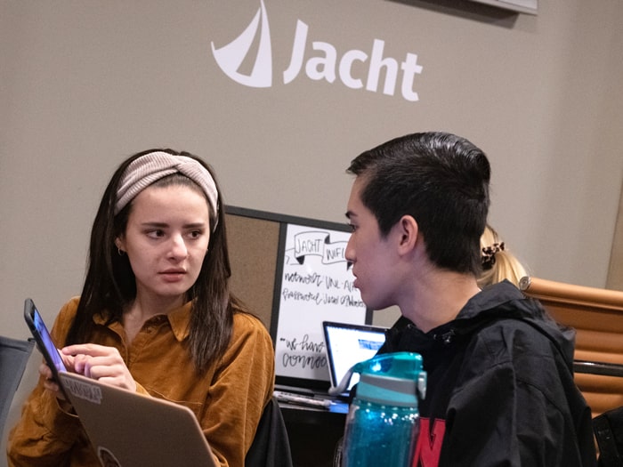 students discussing at Yacht