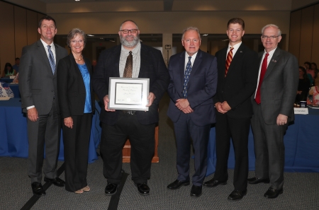 President Bounds;  Catherine Lang, Assistant Dean and State Director of the Nebraska Business Development Center;  Jerry Parriott, recipient; Lou Pol, Dean of the College of Business Administration; Regent Krejdl, Chancellor Gold.