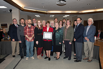 The Cherish Nebraska Team at the University of Nebraska state Museum receiving KUDO's award.