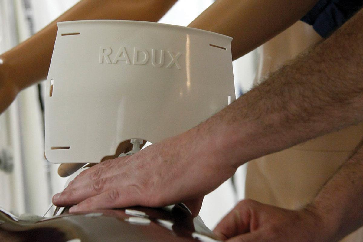 Greg Gordon, MD, founded Radux Devices around two inventions he createdâincluding the Steradian Shield, aboveâthat help protect physicians during fluoroscopic procedures.