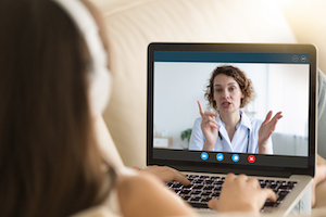 Psychologist doing online education
