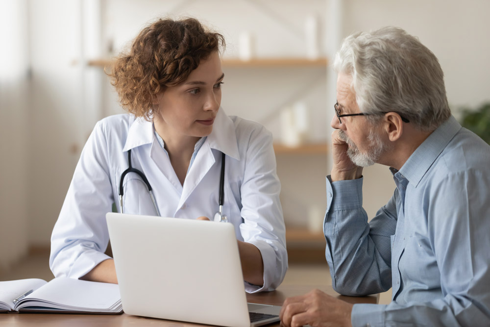 Doctor speaking with a patient